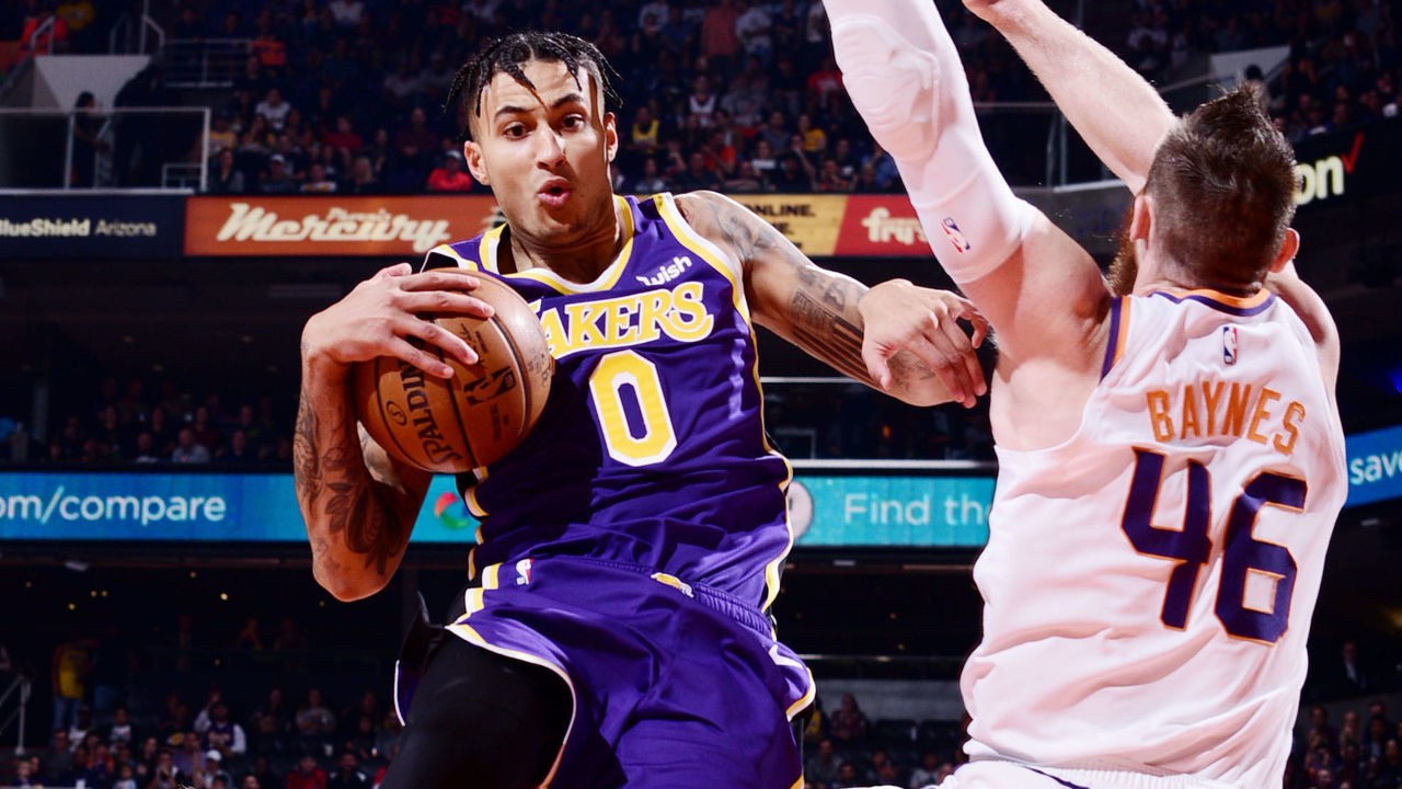 PHOENIX, AZ - NOVEMBER 12: Kyle Kuzma #0 of the Los Angeles Lakers attacks the basket against the Phoenix Suns on November 12, 2019 at Talking Stick Resort Arena in Phoenix, Arizona. Mandatory Copyright Notice: Copyright 2019 NBAE