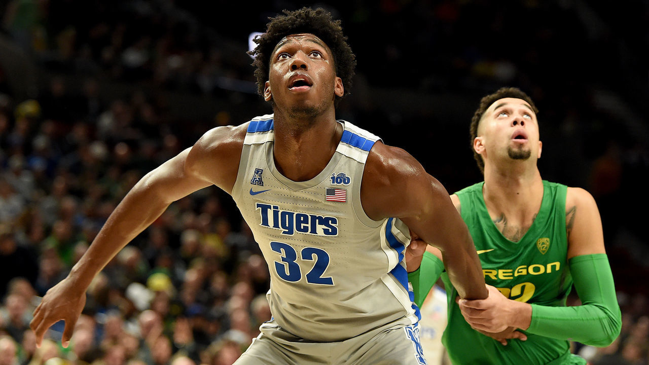 PORTLAND, OREGON - NOVEMBER 12: James Wiseman #32 of the Memphis Tigers and Anthony Mathis #32 of the Oregon Ducks battle for position during the second half of the game at Moda Center on November 12, 2019 in Portland, Oregon. Oregon won the game 82-74.