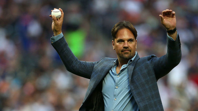 NEW YORK, NY - JUNE 09: Former New York Mets catcher and Hall of Famer Mike Piazza, waves beforer he threw out the first pitch before a game between the New York Yankees and New York Mets at Citi Field on June 9, 2018 in the Flushing neighborhood of the Queens borough of New York City.
