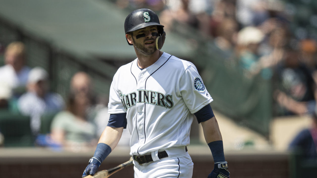 SEATTLE, WA - MAY 29: Mitch Haniger #17 of the Seattle Mariners walks off the field after an at-bat in a game against the Texas Rangers at T-Mobile Park on May 29, 2019 in Seattle, Washington. The Rangers won 8-7.