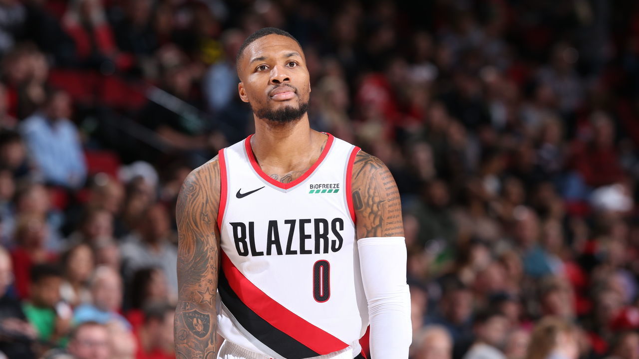PORTLAND, OR - NOVEMBER 10: Damian Lillard #0 of the Portland Trail Blazers looks on during the game against the Atlanta Hawks on November 10, 2019 at the Moda Center Arena in Portland, Oregon. Mandatory Copyright Notice: Copyright 2019 NBAE