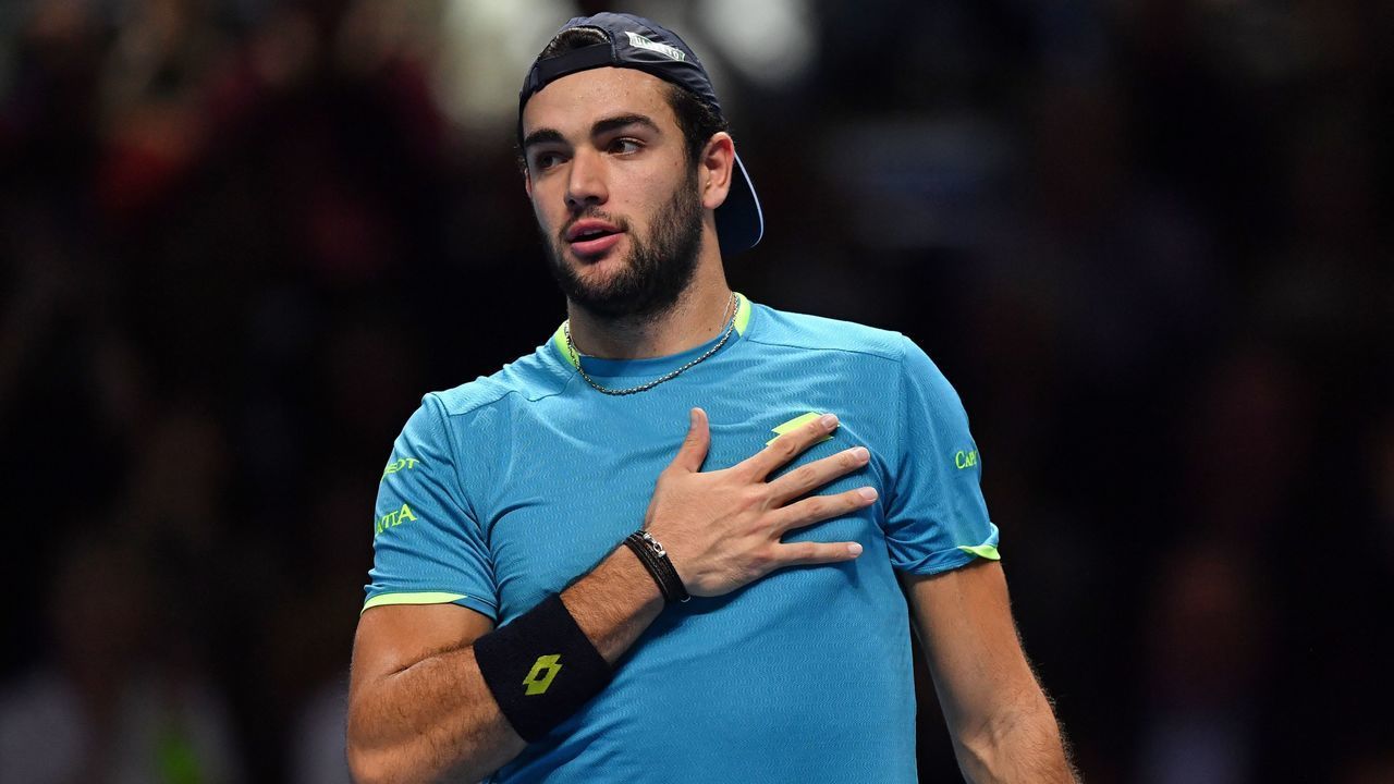 Italy's Matteo Berrettini celebrates after winning in straight sets against Austria's Dominic Thiem in their men's singles round-robin match on day five of the ATP World Tour Finals tennis tournament at the O2 Arena in London on November 14, 2019.