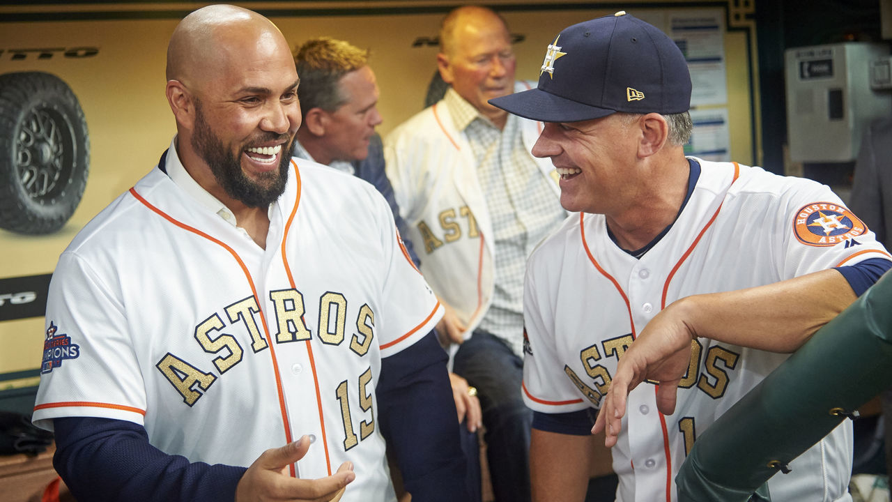 HOUSTON, TX - APRIL 3: Former Houston Astro Carlos Beltran visits with Astros manager AJ Hinch #14 before receiving their World Series Championship rings before the first pitch against the Baltimore Orioles at Minute Maid Park on Monday, April 3, 2018 in Houston, Texas.