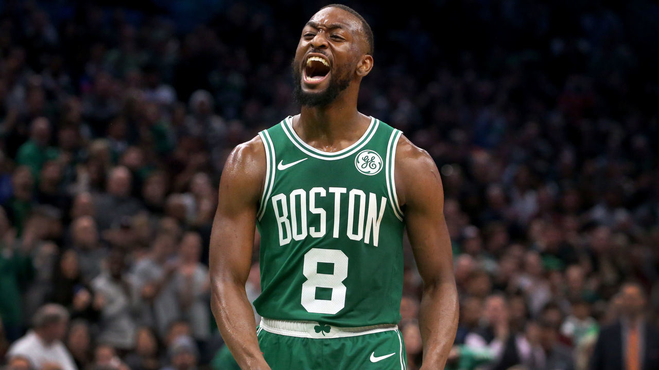 BOSTON - OCTOBER 25: Boston Celtics guard Kemba Walker (8) celebrates after the Celtics took a 110-106 lead on a 25-foot three-pointer by Boston Celtics guard Jaylen Brown (7), not pictured, late in the fourth quarter. The Boston Celtics host the Toronto Raptors in the team's home opening regular season NBA basketball game at TD Garden in Boston on Oct. 25, 2019.