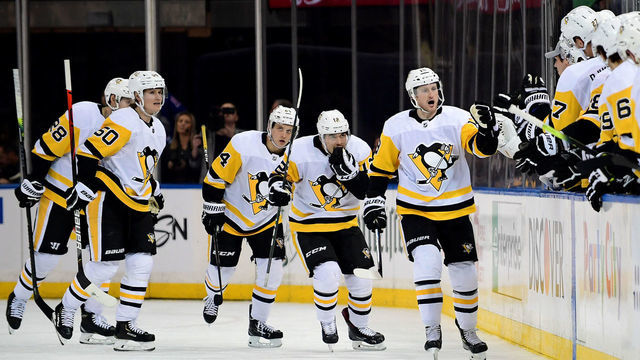 NEW YORK, NEW YORK - NOVEMBER 12: Jared McCann #19 of the Pittsburgh Penguins and his teammates celebrate his second period goal during their game against the New York Rangers at Madison Square Garden on November 12, 2019 in New York City.