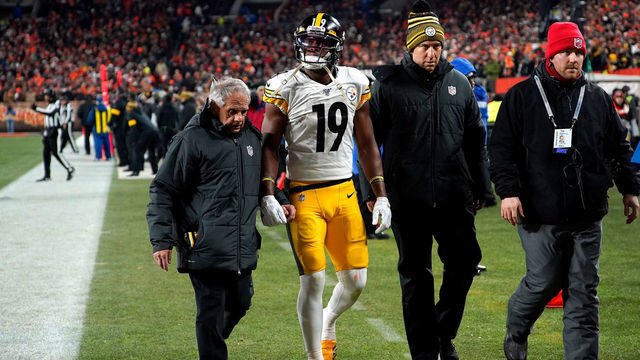 CLEVELAND, OH - NOVEMBER 14: JuJu Smith-Schuster #19 of the Pittsburgh Steelers is helped off of the field after suffering a concussion during the second quarter of the game against the Cleveland Browns at FirstEnergy Stadium on November 14, 2019 in Cleveland, Ohio.