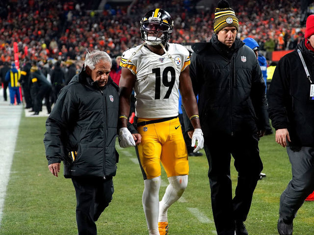 CLEVELAND, OH - NOVEMBER 14: JuJu Smith-Schuster #19 of the Pittsburgh Steelers is helped off of the field after suffering a concussion during the second quarter of the game against the Cleveland Browns at FirstEnergy Stadium on November 14, 2019 in Cleveland, Ohio.