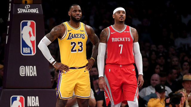 LOS ANGELES, CA - OCTOBER 20: LeBron James #23 of the Los Angeles Lakers and Carmelo Anthony #7 of the Houston Rockets wait for and inbound at Staples Center on October 20, 2018 in Los Angeles, California.