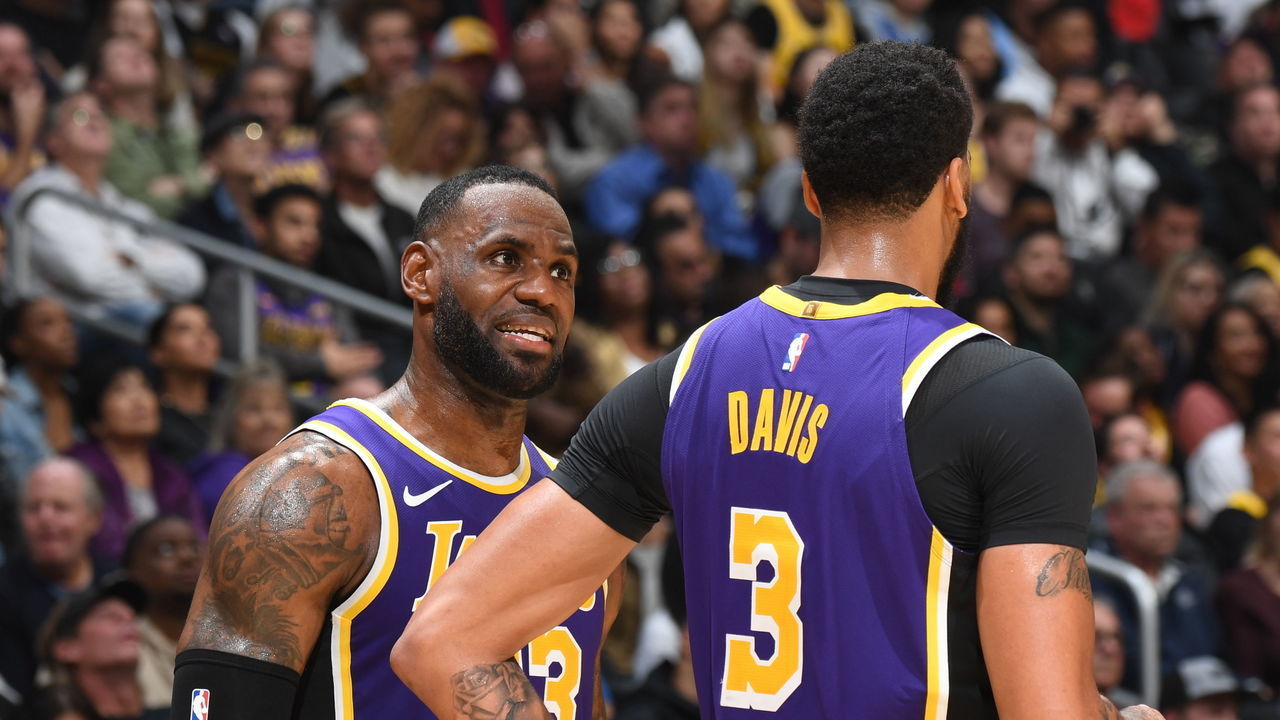 LOS ANGELES, CA - NOVEMBER 15: LeBron James #23 and Anthony Davis #3 of the Los Angeles Lakers talk during a game against the Sacramento Kings on November 15, 2019 at STAPLES Center in Los Angeles, California. NOTE TO USER: User expressly acknowledges and agrees that, by downloading and/or using this Photograph, user is consenting to the terms and conditions of the Getty Images License Agreement. Mandatory Copyright Notice: Copyright 2019 NBAE