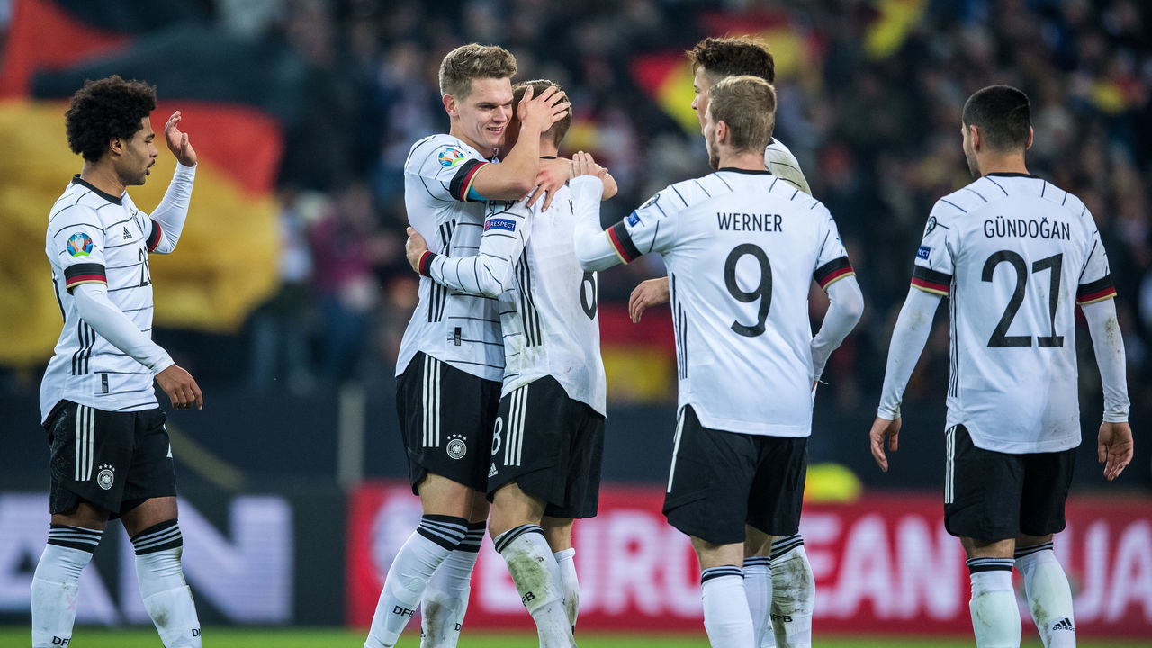 MOENCHENGLADBACH, GERMANY - NOVEMBER 16: Scorer Toni Kroos (3L) of Germany celebrates his team's third goal with Matthias Ginter (2L) and team mates during the UEFA Euro 2020 Qualifier between Germany and Belarus on November 16, 2019 in Moenchengladbach, Germany.