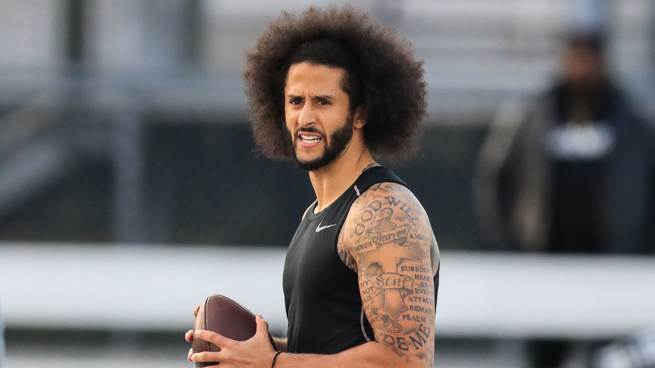 RIVERDALE, GA - NOVEMBER 16: Colin Kaepernick looks to make a pass during a private NFL workout held at Charles R Drew high school on November 16, 2019 in Riverdale, Georgia. Due to disagreements between Kaepernick and the NFL the location of the workout was abruptly changed.