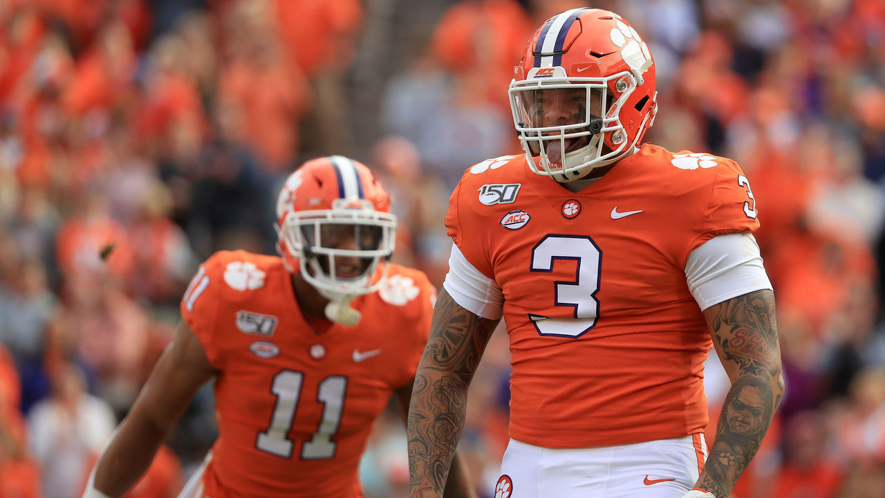 CLEMSON, SOUTH CAROLINA - NOVEMBER 16: Teammates Xavier Thomas #3 and Isaiah Simmons #11 of the Clemson Tigers react after a play against the Wake Forest Demon Deacons during their game at Memorial Stadium on November 16, 2019 in Clemson, South Carolina.