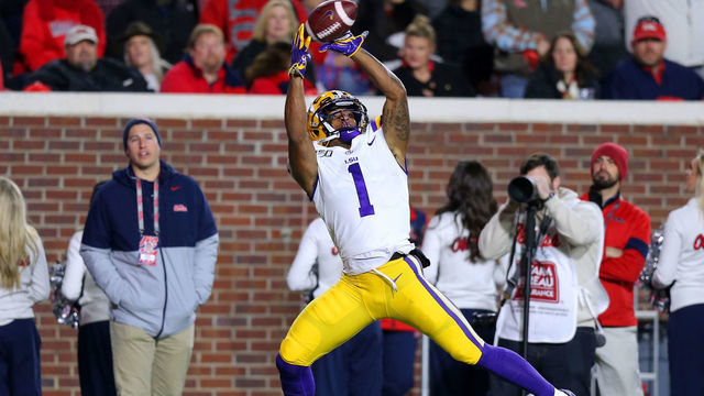 OXFORD, MISSISSIPPI - NOVEMBER 16: Ja'Marr Chase #1 of the LSU Tigers catches the ball for a touchdown during the first half of a game against the Mississippi Rebels at Vaught-Hemingway Stadium on November 16, 2019 in Oxford, Mississippi.