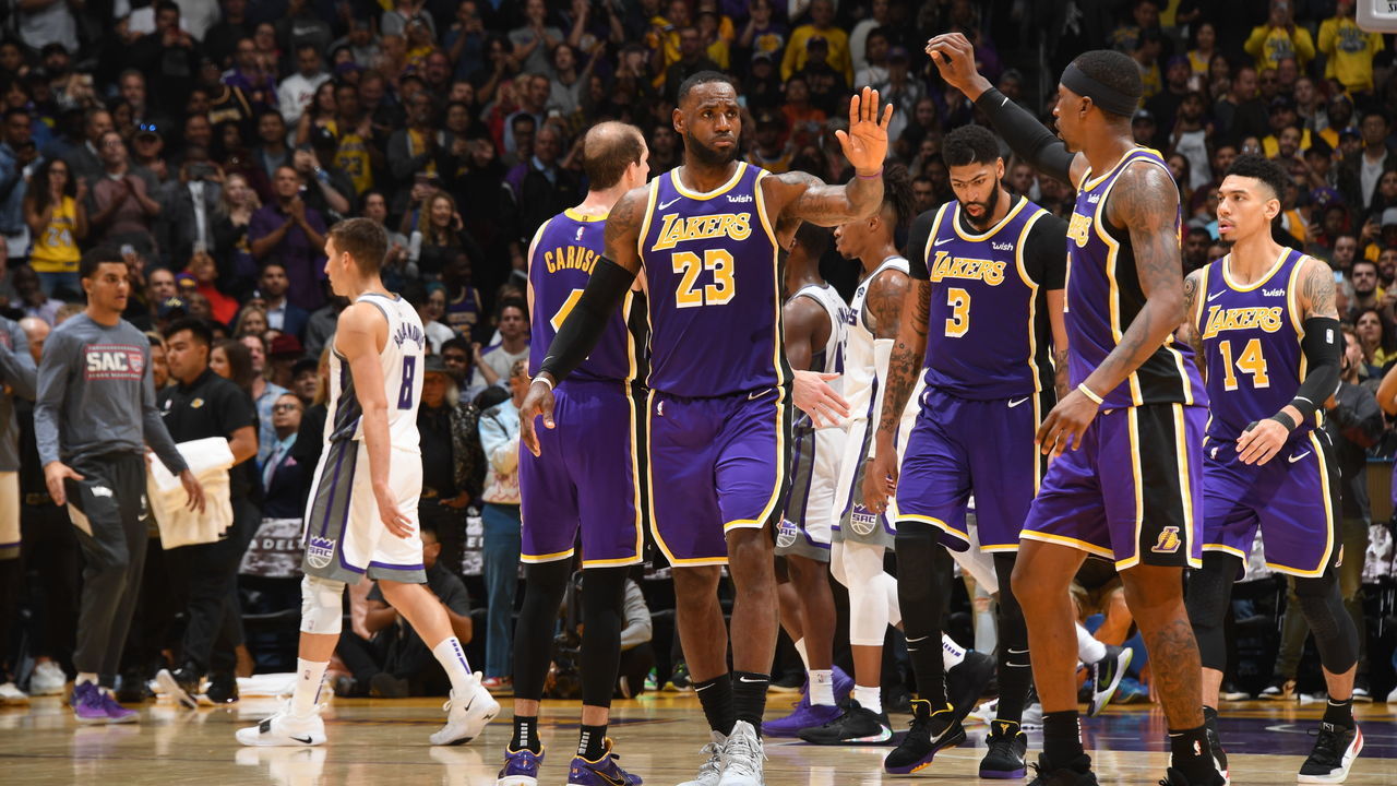 LOS ANGELES, CA - NOVEMBER 15: LeBron James #23 and Kentavious Caldwell-Pope #1 of the Los Angeles Lakers hi-five during a game against the Sacramento Kings on November 15, 2019 at STAPLES Center in Los Angeles, California. NOTE TO USER: User expressly acknowledges and agrees that, by downloading and/or using this Photograph, user is consenting to the terms and conditions of the Getty Images License Agreement. Mandatory Copyright Notice: Copyright 2019 NBAE