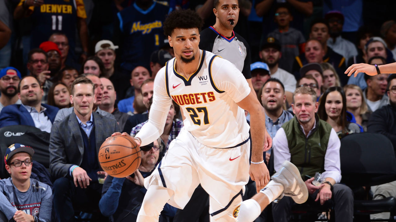 DENVER, CO - NOVEMBER 14: Jamal Murray #27 of the Denver Nuggets handles the ball against the Brooklyn Nets on November 14, 2019 at the Pepsi Center in Denver, Colorado. NOTE TO USER: User expressly acknowledges and agrees that, by downloading and/or using this Photograph, user is consenting to the terms and conditions of the Getty Images License Agreement. Mandatory Copyright Notice: Copyright 2019 NBAE