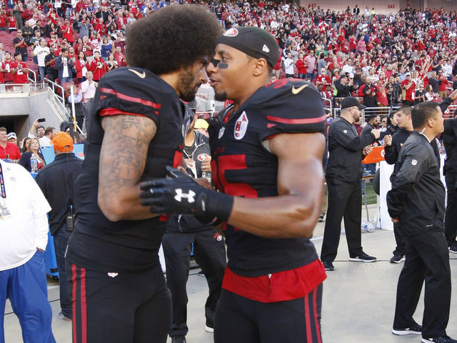 Eric Reid of the San Francisco 49ers stands on the sideline prior to