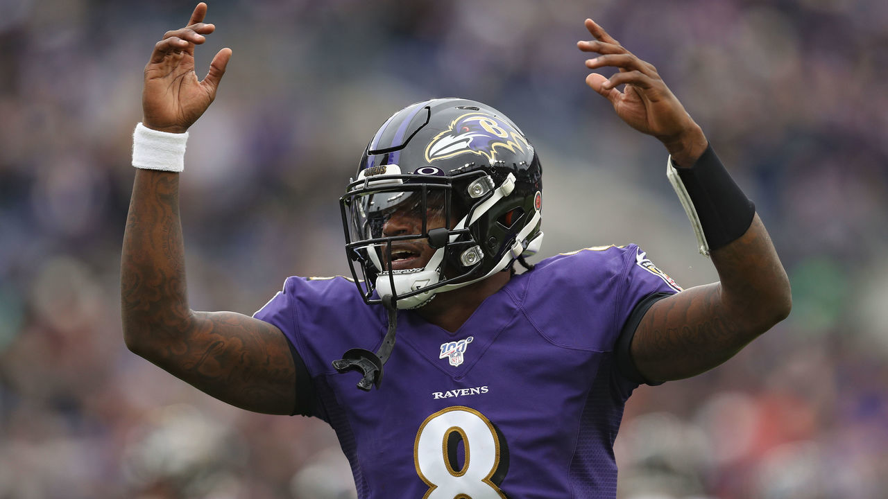 BALTIMORE, MARYLAND - NOVEMBER 17: Quarterback Lamar Jackson #8 of the Baltimore Ravens reacts after throwing a touchdown pass to tight end Mark Andrews #89 of the Baltimore Ravens (not pictured) against the Houston Texans during the second quarter at M&T Bank Stadium on November 17, 2019 in Baltimore, Maryland.