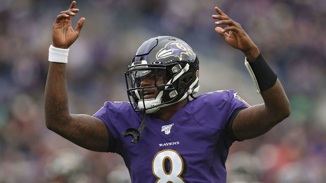 BALTIMORE, MARYLAND - NOVEMBER 17: Quarterback Lamar Jackson #8 of the Baltimore Ravens reacts after throwing a touchdown pass to tight end Mark Andrews #89 of the Baltimore Ravens (not pictured) against the Houston Texans during the second quarter at M&T Bank Stadium on November 17, 2019 in Baltimore, Maryland.