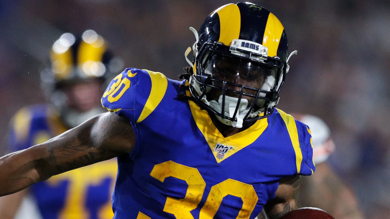 LOS ANGELES, CALIFORNIA - NOVEMBER 17: Todd Gurley II #30 of the Los Angeles Rams runs with the ball during the first half of a game against the Chicago Bears at Los Angeles Memorial Coliseum on November 17, 2019 in Los Angeles, California.
