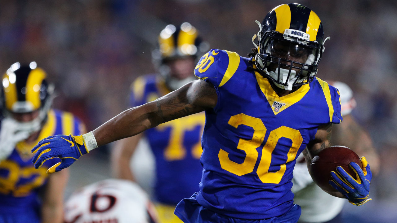 LOS ANGELES, CALIFORNIA - NOVEMBER 17: Todd Gurley II #30 of the Los Angeles Rams runs with the ball during the first half of a game against the Chicago Bears at Los Angeles Memorial Coliseum on November 17, 2019 in Los Angeles, California.