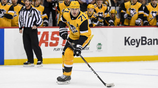 PITTSBURGH, PA - NOVEMBER 09: Pittsburgh Penguins Center Evgeni Malkin (71) skates with the puck during the overtime period in the NHL game between the Pittsburgh Penguins and the Chicago Blackhawks on November 9, 2019, at PPG Paints Arena in Pittsburgh, PA.