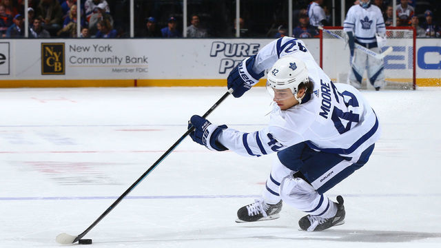 UNIONDALE, NEW YORK - NOVEMBER 13: Trevor Moore #42 of the Toronto Maple Leafs skates with the puck during the second period of the game against the New York Islanders at NYCB Live's Nassau Coliseum on November 13, 2019 in Uniondale, New York.