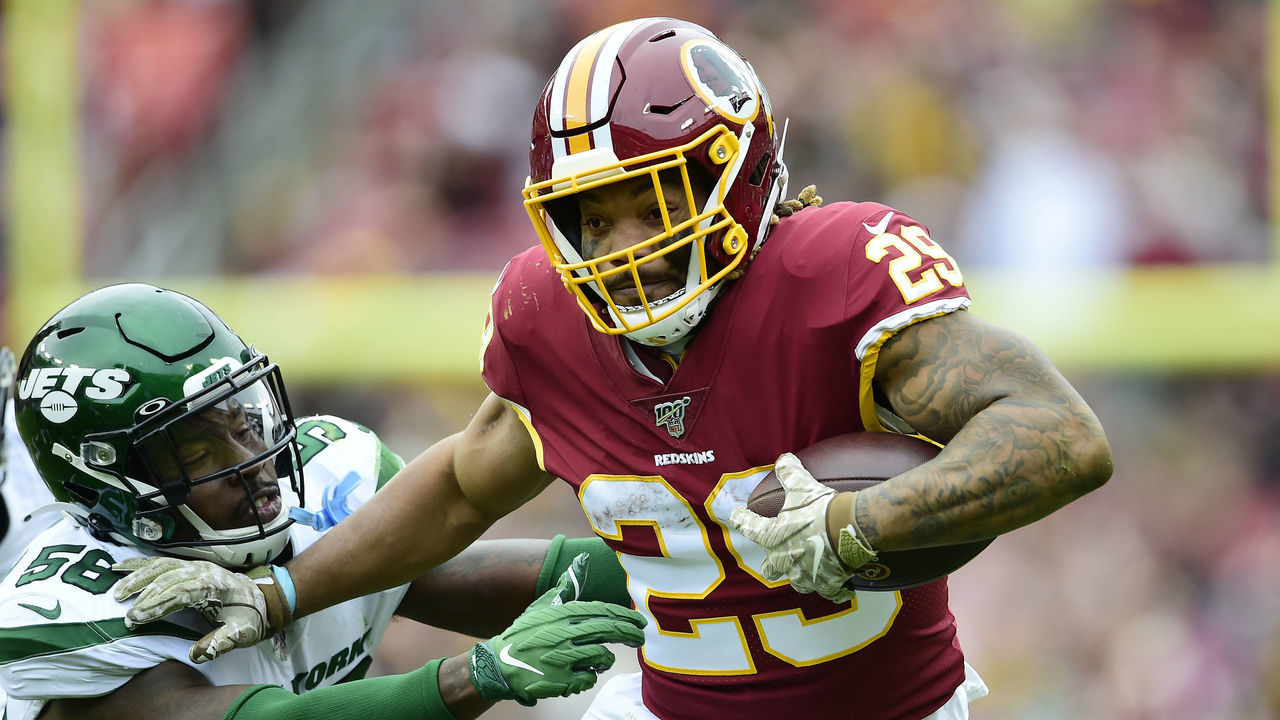 LANDOVER, MD - NOVEMBER 17: Derrius Guice #29 of the Washington Redskins runs with the ball against James Burgess #58 of the New York Jets in the first half at FedExField on November 17, 2019 in Landover, Maryland.