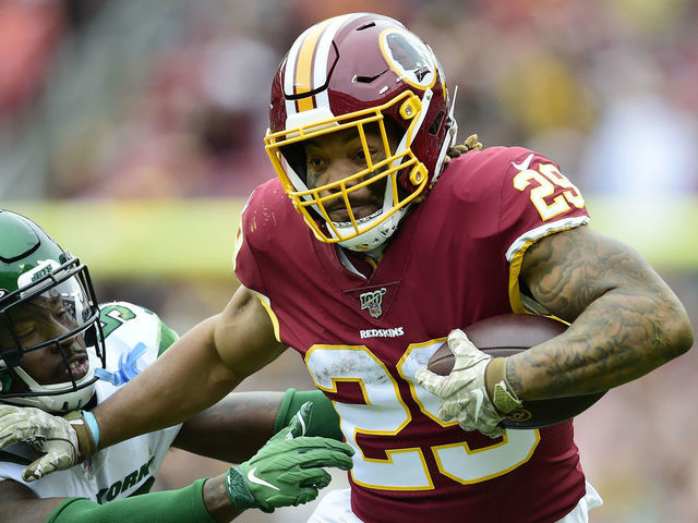 LANDOVER, MD - NOVEMBER 17: Derrius Guice #29 of the Washington Redskins runs with the ball against James Burgess #58 of the New York Jets in the first half at FedExField on November 17, 2019 in Landover, Maryland.