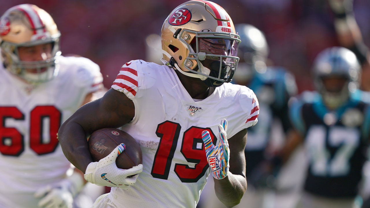 SANTA CLARA, CALIFORNIA - OCTOBER 27: Deebo Samuel #19 of the San Francisco 49ers carries the ball for a 20 yard touchdown run against the Carolina Panthers during the third quarter of an NFL football game at Levi's Stadium on October 27, 2019 in Santa Clara, California.