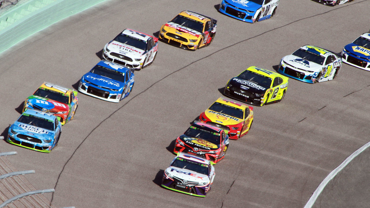 HOMESTEAD, FL - NOVEMBER 17: The field runs through turn four to start the NASCAR Monster Energy Cup Series EcoBoost 400 at Homestead-Miami Speedway on November 17, 2019.