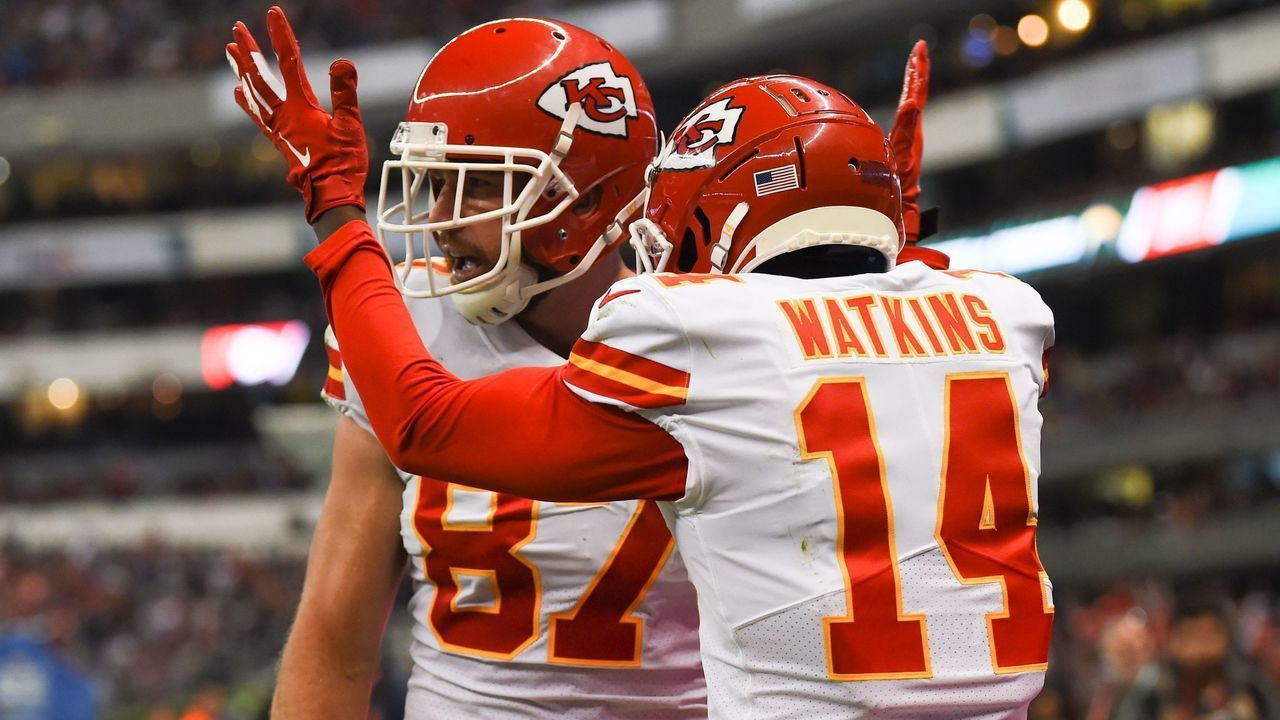 Kansas City Chiefs tight end Travis Kelce (L) celebrates his touchdown with teammate Sammy Watkins during the 2019 NFL week 11 regular season football game between Kansas City Chiefs and Los Angeles Chargers on November 18, 2019, at the Azteca Stadium in Mexico City.