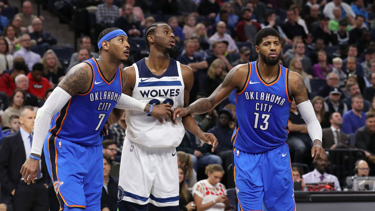 MINNEAPOLIS, MN - JANUARY 10: Carmelo Anthony #7 of the Oklahoma City Thunder, Andrew Wiggins #22 of the Minnesota Timberwolves, and Paul George #13 of the Oklahoma City Thunder wait for the ball on January 10, 2018 at Target Center in Minneapolis, Minnesota. Mandatory Copyright Notice: Copyright 2018 NBAE