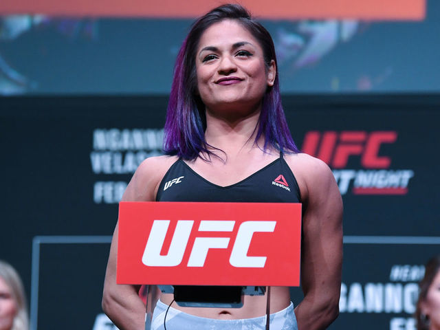 PHOENIX, ARIZONA - FEBRUARY 16: Cynthia Calvillo poses on the scale during the UFC Fight Night weigh-in at Comerica Theatre on February 16, 2019 in the Phoenix, Arizona.