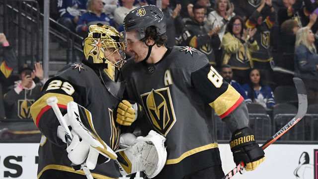LAS VEGAS, NEVADA - NOVEMBER 19: Marc-Andre Fleury #29 and Mark Stone #61 of the Vegas Golden Knights celebrate after Stone scored a third-period power-play goal against the Toronto Maple Leafs during their game at T-Mobile Arena on November 19, 2019 in Las Vegas, Nevada. The Golden Knights defeated the Leafs 4-2.