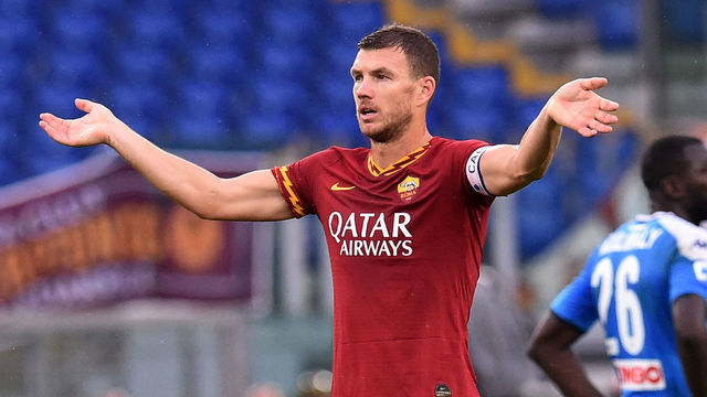 ROME, ITALY - NOVEMBER 02: Edin Dzeko of AS Roma invites the fans to incite their team after the referee Gianluca Rocchi temporarily has suspended the game due to racial slurs by Roma's Curva Sud supporters during the Serie A match between AS Roma and SSC Napoli at Stadio Olimpico on November 2, 2019 in Rome, Italy.