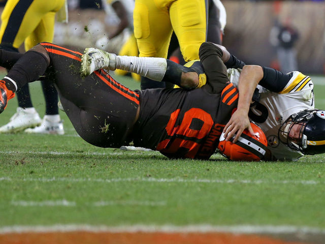 CLEVELAND, OH - NOVEMBER 14: Cleveland Browns defensive end Myles Garrett (95) takes Pittsburgh Steelers quarterback Mason Rudolph (2) to the ground during the fourth quarter of the National Football League game between the Pittsburgh Steelers and Cleveland Browns on November 14, 2019, at FirstEnergy Stadium in Cleveland, OH.