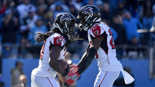 CHARLOTTE, NORTH CAROLINA - NOVEMBER 17: Desmond Trufant #21 celebrates with Damontae Kazee #27 of the Atlanta Falcons after intercepting a pass against the Carolina Panthers during the second quarter of their game at Bank of America Stadium on November 17, 2019 in Charlotte, North Carolina.