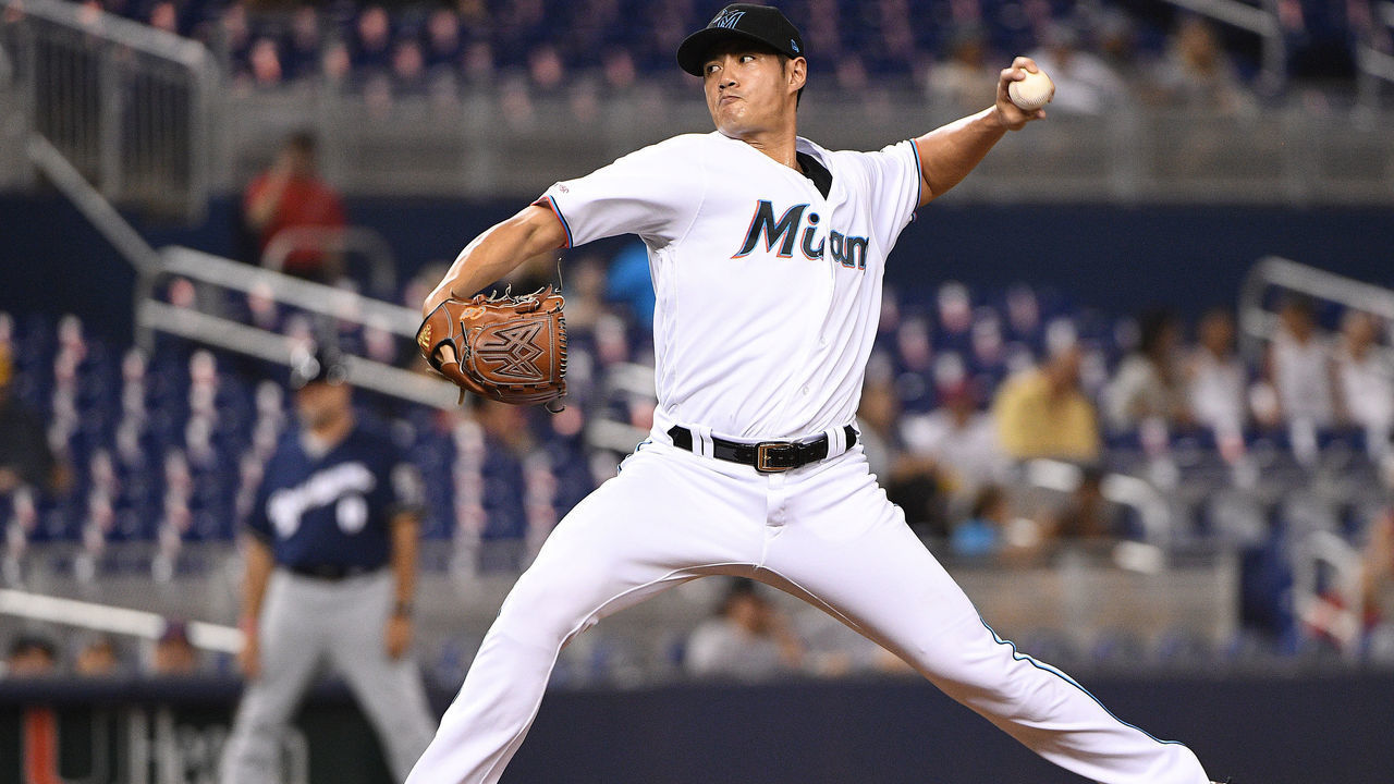 MIAMI, FLORIDA - SEPTEMBER 09: Wei-Yin Chen #20 of the Miami Marlins delivers a pitch against the Milwaukee Brewers at Marlins Park on September 09, 2019 in Miami, Florida.