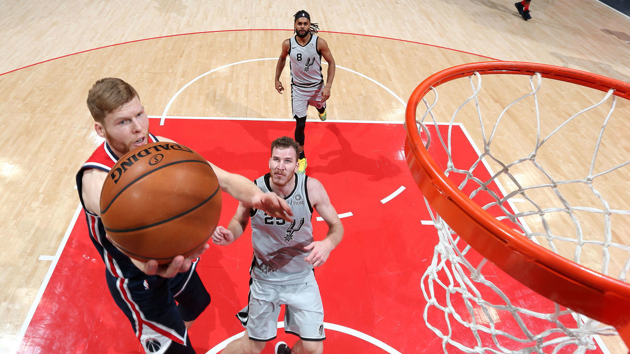 WASHINGTON, DC - NOVEMBER 20: Davis Bertans #42 of the Washington Wizards drives to the basket against the San Antonio Spurs on November 20, 2019 at Capital One Arena in Washington, DC.