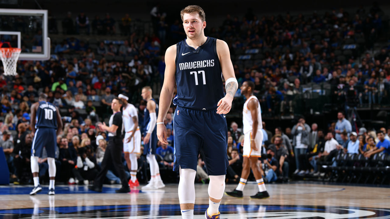 DALLAS, TX - NOVEMBER 20: Luka Doncic #77 of the Dallas Mavericks walks down the court during a game against the Golden State Warriors on November 20, 2019 at the American Airlines Center in Dallas, Texas. Mandatory Copyright Notice: Copyright 2019 NBAE