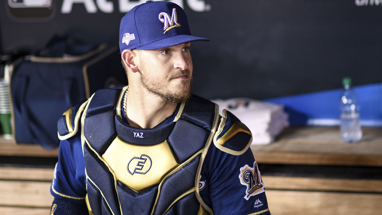 WASHINGTON, DC - OCTOBER 01: Milwaukee Brewers catcher Yasmani Grandal (10) comes into the dugout for the Wild Card game against the Washington Nationals on October 1, 2019, at Nationals Park, in Washington D.C.