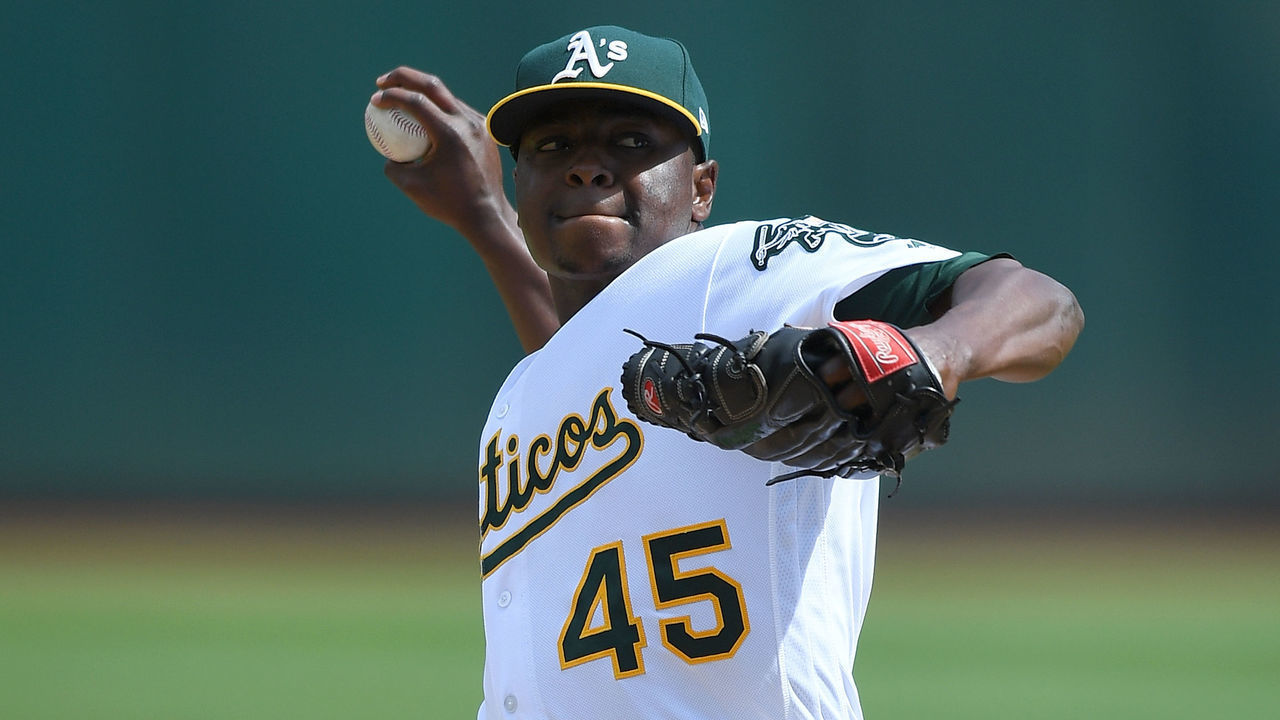 OAKLAND, CA - SEPTEMBER 24: Jharel Cotton #45 of the Oakland Athletics pitches against the Texas Rangers in the top of the first inning at Oakland Alameda Coliseum on September 24, 2017 in Oakland, California.