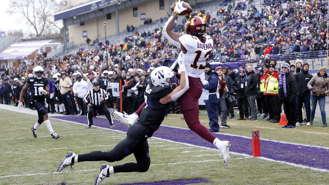 EVANSTON, ILLINOIS - NOVEMBER 23: Rashod Bateman #13 of the Minnesota Golden Gophers makes a catch for a touchdown in front of Travis Whillock #7 of the Northwestern Wildcats during the first quarter at Ryan Field on November 23, 2019 in Evanston, Illinois.