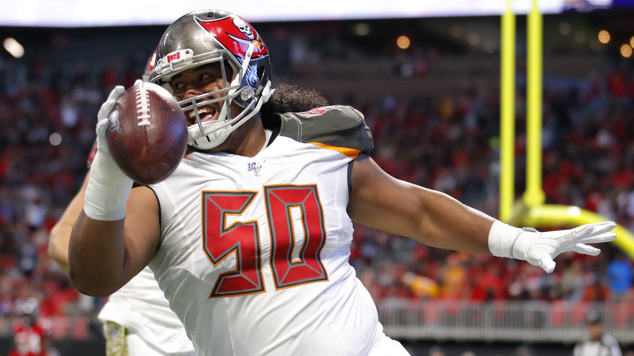 ATLANTA, GA - NOVEMBER 24: Vita Vea #50 of the Tampa Bay Buccaneers reacts after making a touchdown reception during the first half of an NFL game against the Atlanta Falcons at Mercedes-Benz Stadium on November 24, 2019 in Atlanta, Georgia.
