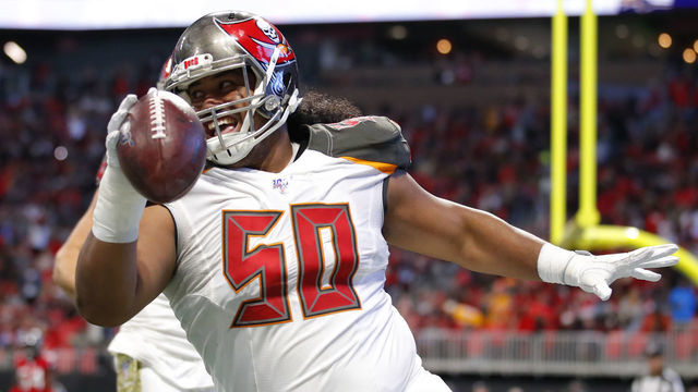 ATLANTA, GA - NOVEMBER 24: Vita Vea #50 of the Tampa Bay Buccaneers reacts after making a touchdown reception during the first half of an NFL game against the Atlanta Falcons at Mercedes-Benz Stadium on November 24, 2019 in Atlanta, Georgia.