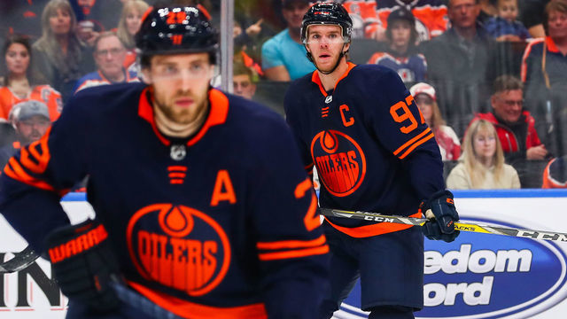 EDMONTON, AB - OCTOBER 18: Edmonton Oilers Center Connor McDavid (97) and Edmonton Oilers Left Wing Leon Draisaitl (29) in action while sporting the new 2019 Oilers third jersey in the first period during the Edmonton Oilers game versus the Detroit Red Wings on October 18, 2019 at Rogers Place in Edmonton, AB.