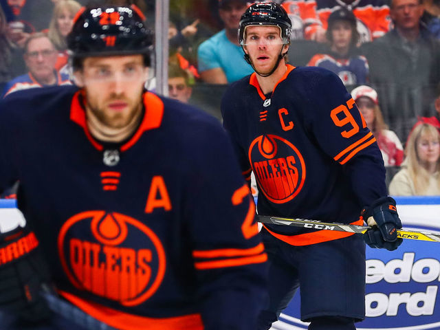 EDMONTON, AB - OCTOBER 18: Edmonton Oilers Center Connor McDavid (97) and Edmonton Oilers Left Wing Leon Draisaitl (29) in action while sporting the new 2019 Oilers third jersey in the first period during the Edmonton Oilers game versus the Detroit Red Wings on October 18, 2019 at Rogers Place in Edmonton, AB.
