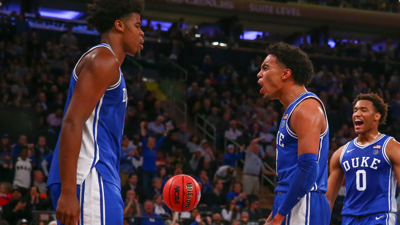 NEW YORK, NY - NOVEMBER 22: Duke Blue Devils guard Tre Jones (3) reacts after Duke Blue Devils center Vernon Carey Jr. (1) makes a basket during the first half of the 2K Empire Classic college basketball game between the Duke Blue Devils and the Georgetown Hoyas on November 22, 2019 at Madison Square Garden in New York, NY.