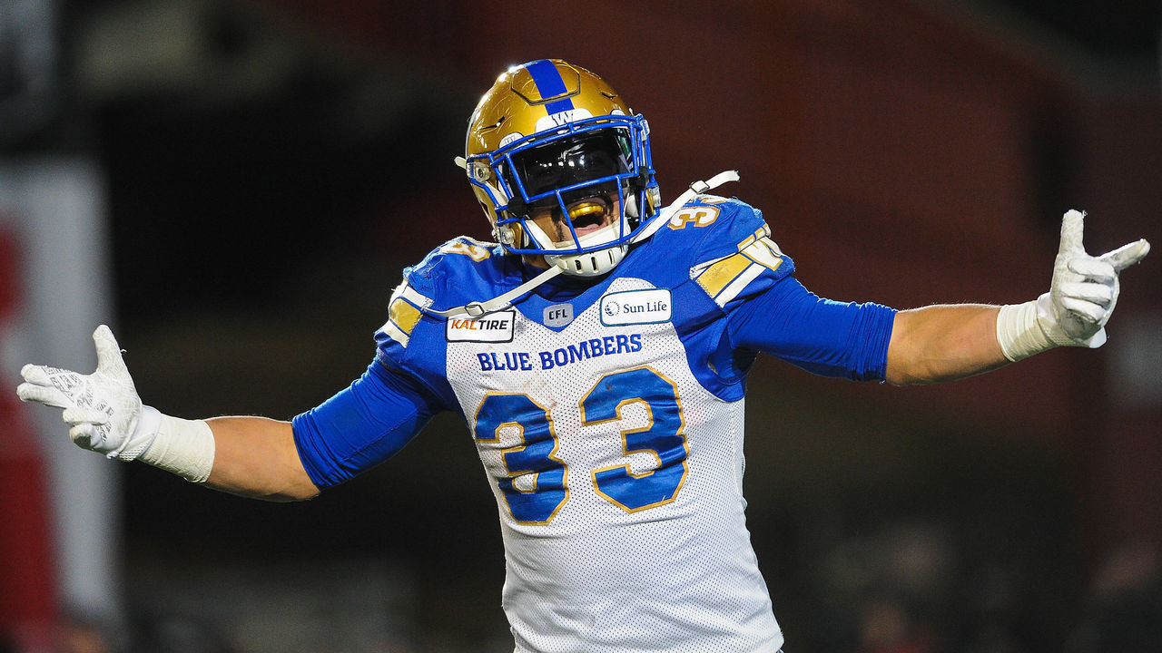 CALGARY, AB - NOVEMBER 24: Andrew Harris #33 of the Winnipeg Blue Bombers celebrates after scoring a touchdown against the Hamilton Tiger-Cats during the 107th Grey Cup Championship Game at McMahon Stadium on November 24, 2019 in Calgary, Alberta, Canada.