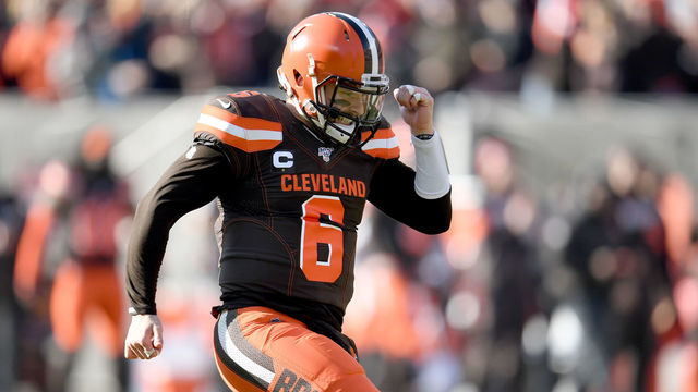 CLEVELAND, OHIO - NOVEMBER 24: Quarterback Baker Mayfield #6 of the Cleveland Browns celebrates after throwing a touchdown pass to wide receiver Odell Beckham #13 of the Cleveland Browns during the first half against the Miami Dolphins at FirstEnergy Stadium on November 24, 2019 in Cleveland, Ohio.